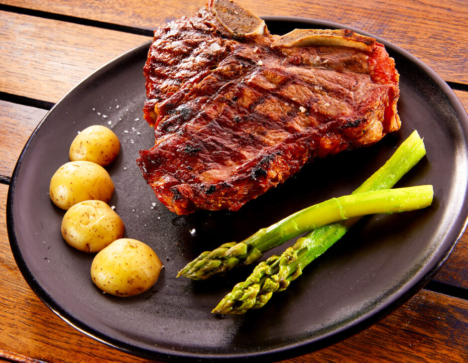 Steak, Potatoes, and asparagus on a plate