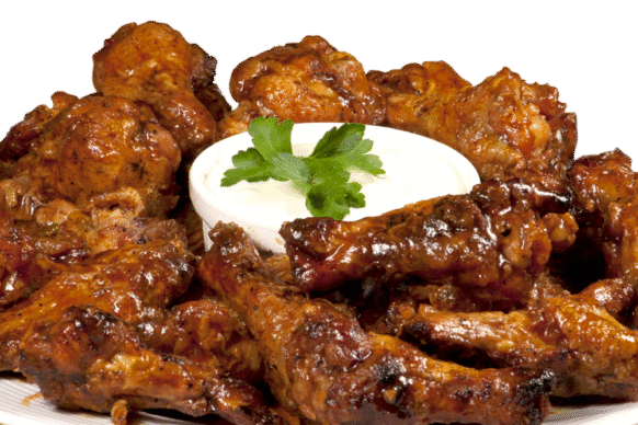 Chicken wings around a cup of ranch
